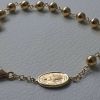 Picture of Rosary Cuff Bracelet with Miraculous Medal of Our Lady of Graces and Cross gr 7,3 Yellow Gold 18k with Smooth Spheres Unisex Woman Man