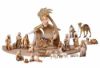 Picture of Kneeling lamb cm 10 (3,9 inch) hand painted Comet Nativity Scene Val Gardena wooden Statue traditional Arabic style