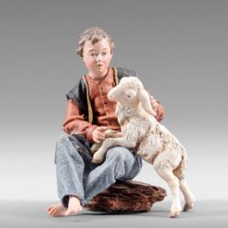 Picture of Boy sitting with Lamb 14 cm (5,5 inch) Rustika wooden Nativity in peasant style with fabric clothes